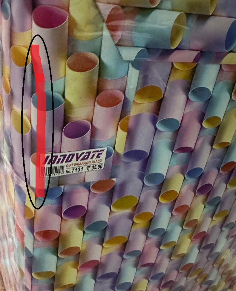 Gift wrap reference — cut vertically along the marked area on the stapled joint
